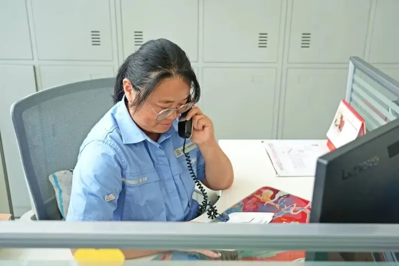 A procurement officer discussing relevant details